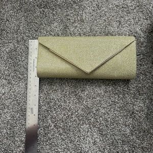 Gold metallic evening clutch